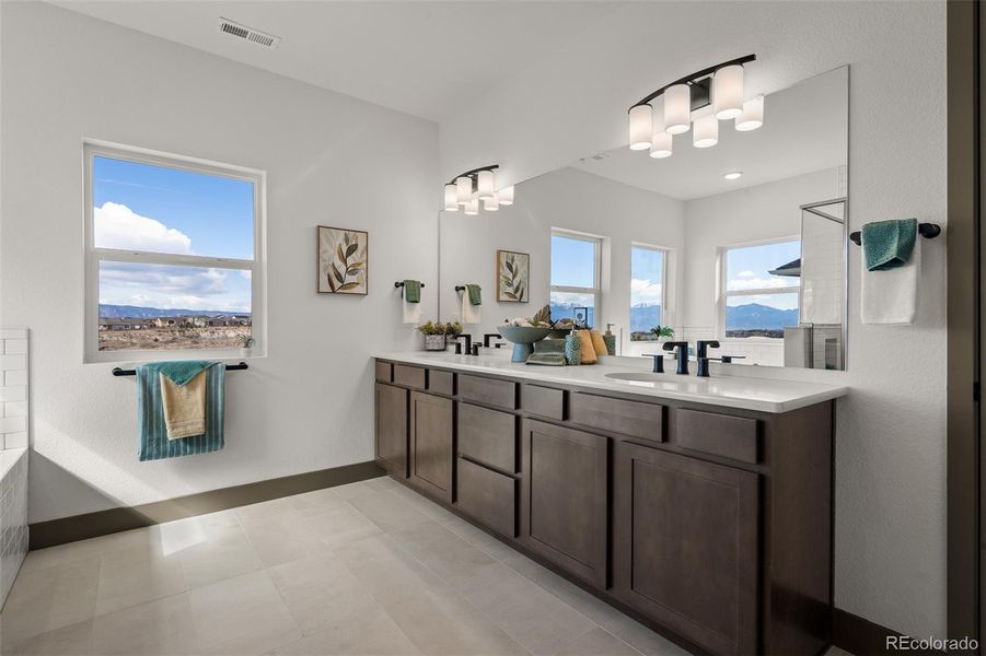 Furnished interior view inside a new home in Revel Crossing at Wolf Ranch - The Panorama Collection, Colorado Springs (Image 26).