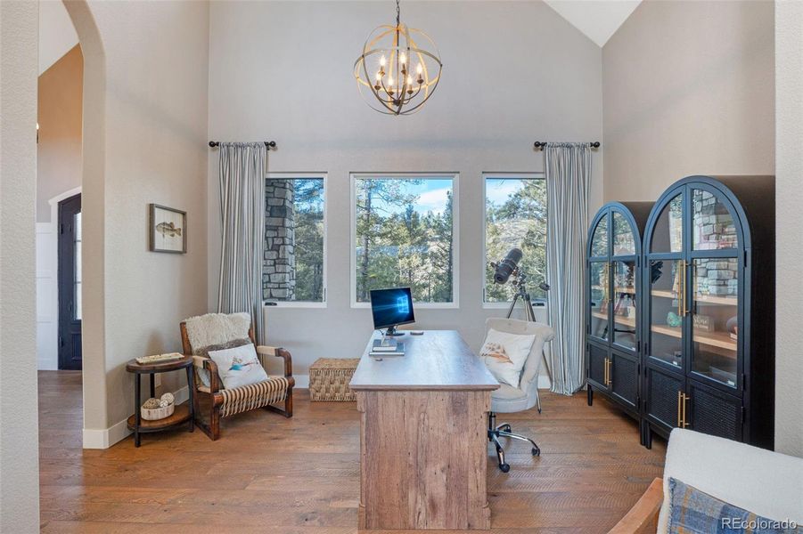 With thoughtful modification the home office offers flexible potential as an extra bedroom or cozy bunk room