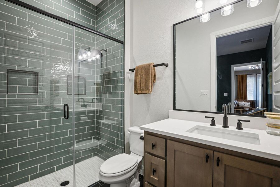 Designed for total independence and comfort, this fully private in-law space features a spacious living room separate from the main household, a full kitchen for culinary autonomy, a comfortable bedroom with a stylish bath, and its own dedicated laundry room.