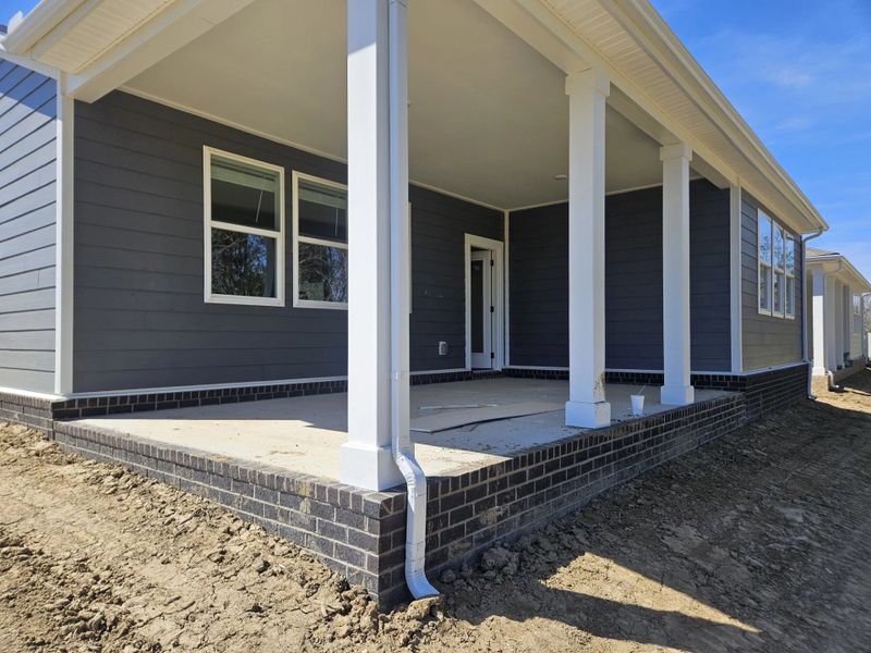 Exterior details and patio area of a home in Cedars of Cane Ridge | 55+ Community, Antioch (Image 4). Exterior details and patio area of a home in Cedars of Cane Ridge | 55+ Community, Antioch (Image 4).