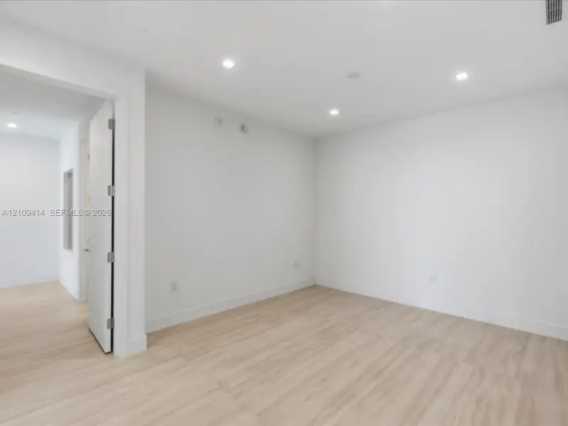Spacious, unfurnished interior of a new home in , North Miami (Image 40).