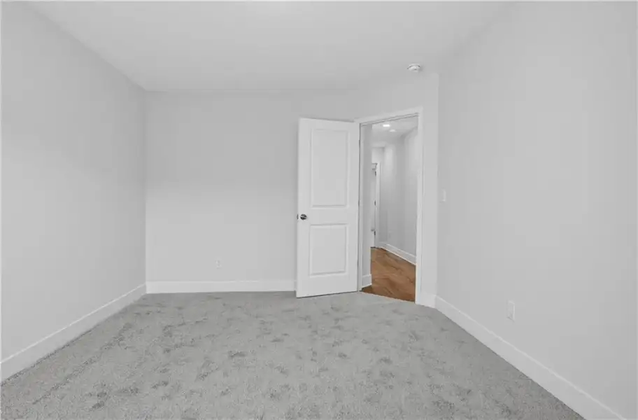 Spacious, unfurnished interior of a new home in Towns at Holly Springs, Holly Springs (Image 25).