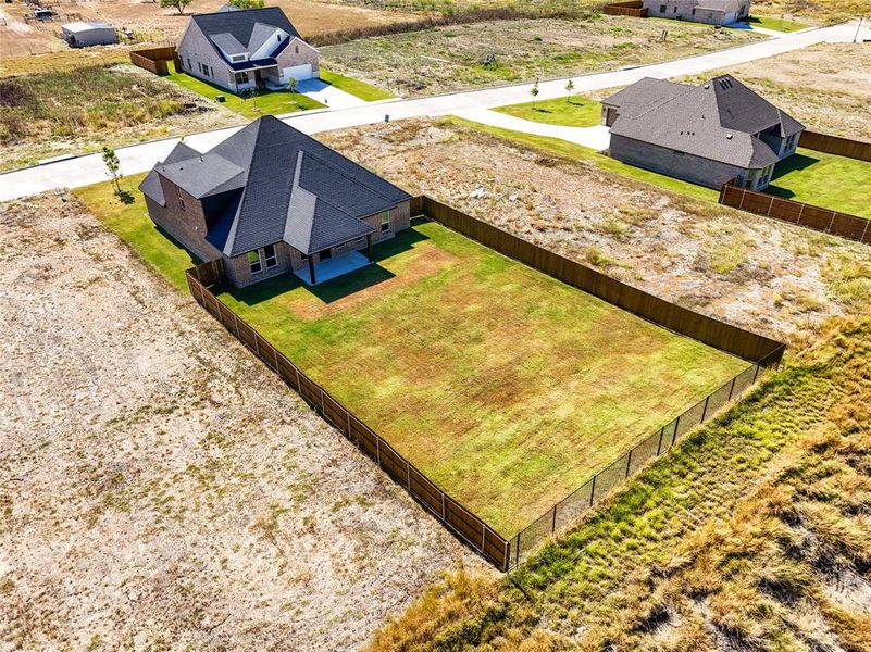 Front exterior of a new home in , Venus, TX, highlighting curb appeal (Image 23).