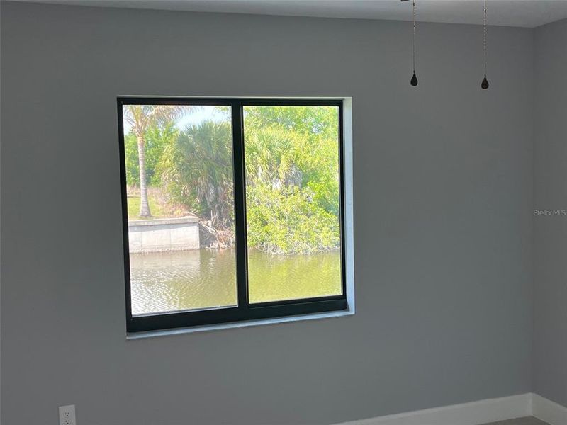 Spacious, unfurnished interior of a new home in , Port Charlotte (Image 12).