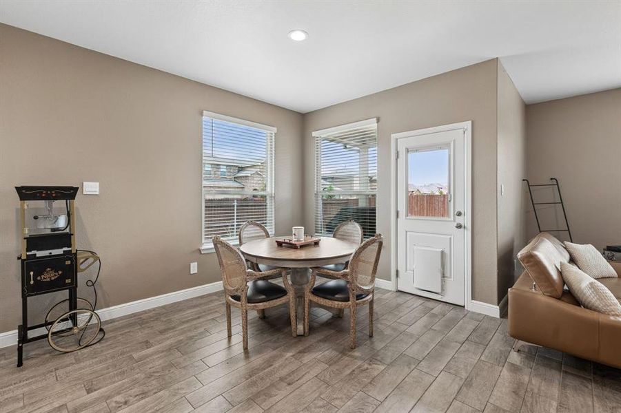 Warm-toned interior with wood-finish flooring