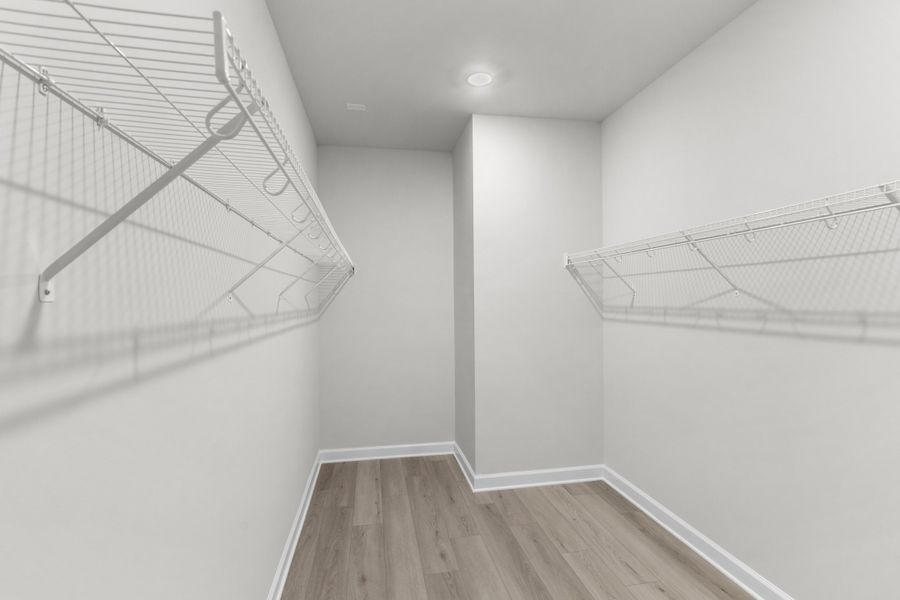 Spacious, unfurnished interior of a new home in Cypress Ridge - The Boardwalk Series, Longs (Image 24).