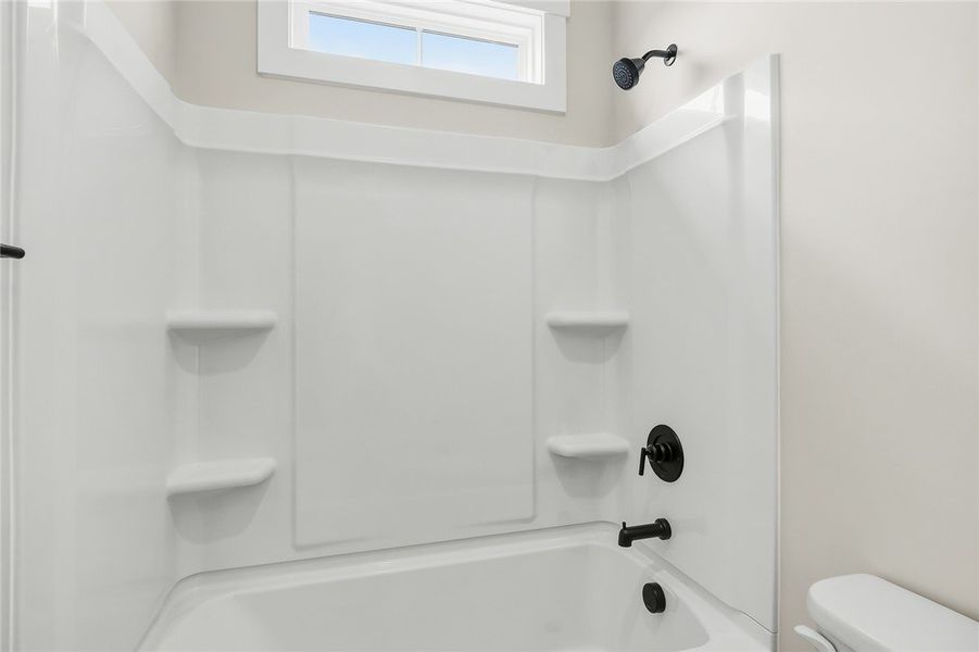 Natural light filters through a transom window abo