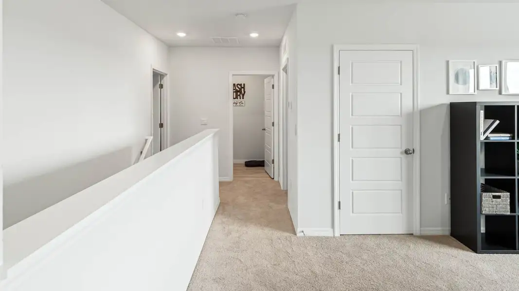 Representative unfurnished interior of a home built from the Hayden by D.R. Horton in James Landing, Leesburg (Image 22).