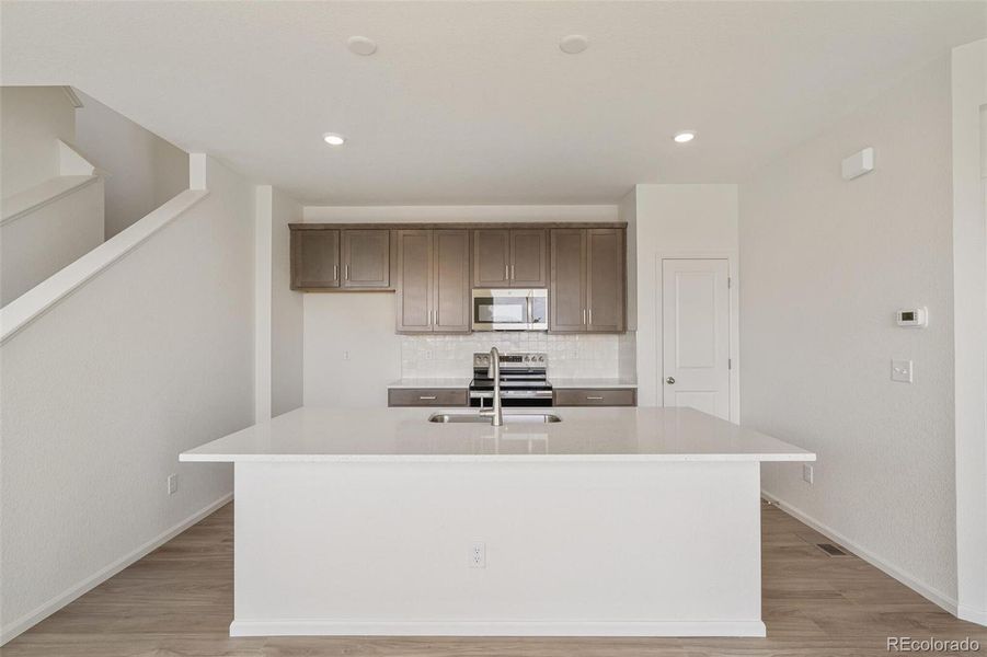 Furnished interior view inside a new home in Windler Villas, Aurora (Image 15).