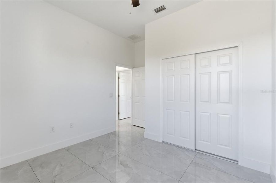 Spacious, unfurnished interior of a new home in , Port Charlotte (Image 17).