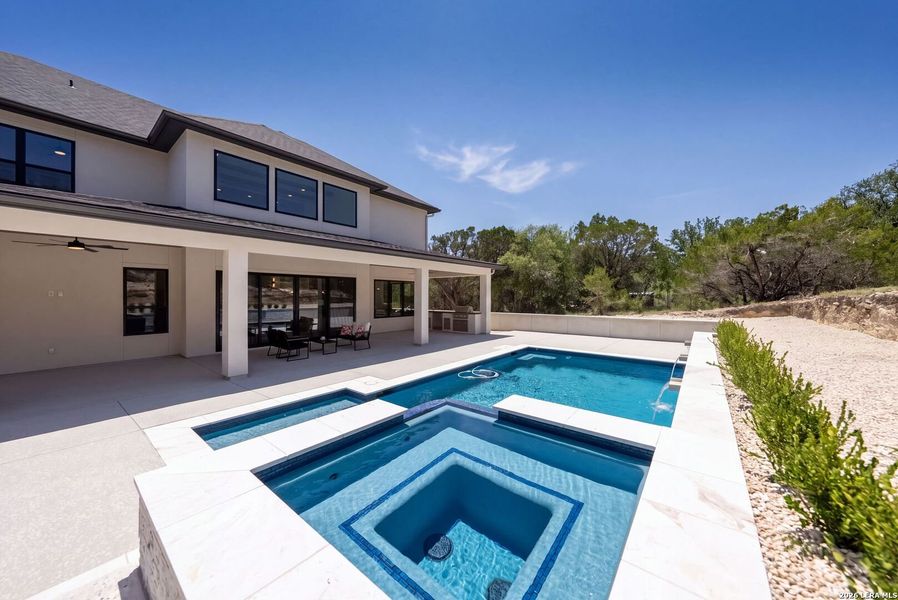 Exterior details and patio area of a home in , Boerne (Image 43).