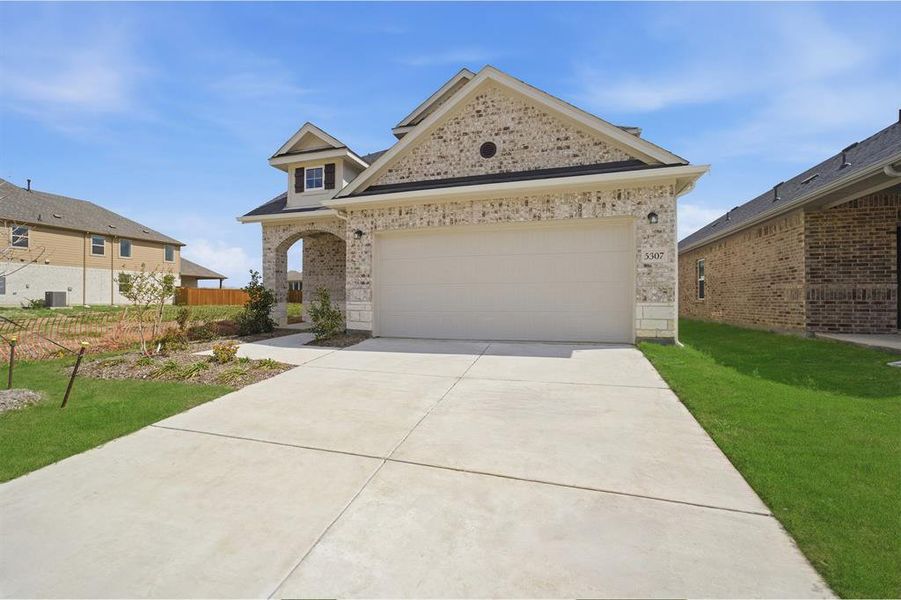 Front exterior of a new home in Westridge, McKinney, TX, highlighting curb appeal (Image 21).