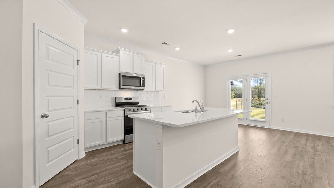 Representative furnished interior of a home built from the Iberville by D.R. Horton in Independence, Loganville (Image 4).