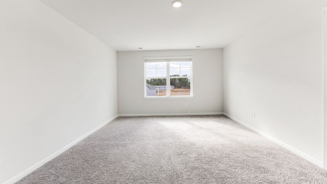 Representative unfurnished interior of a home built from the HAYDEN by D.R. Horton in Sidbury Station, Castle Hayne (Image 31).
