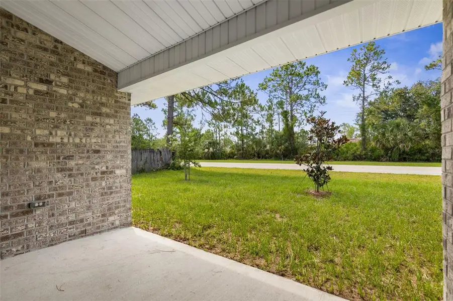 Exterior details and patio area of a home in Palm Coast, Palm Coast (Image 4).