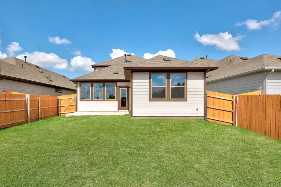 Exterior details and patio area of a home in Trinity Ranch, Elgin (Image 4).