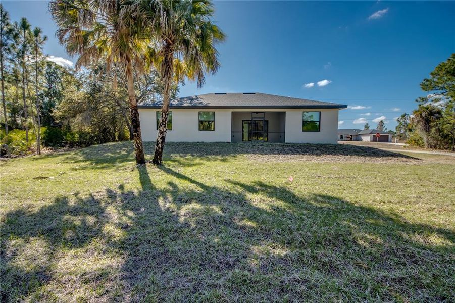 Exterior details and patio area of a home in , Lehigh Acres (Image 27). Exterior details and patio area of a home in , Lehigh Acres (Image 27).