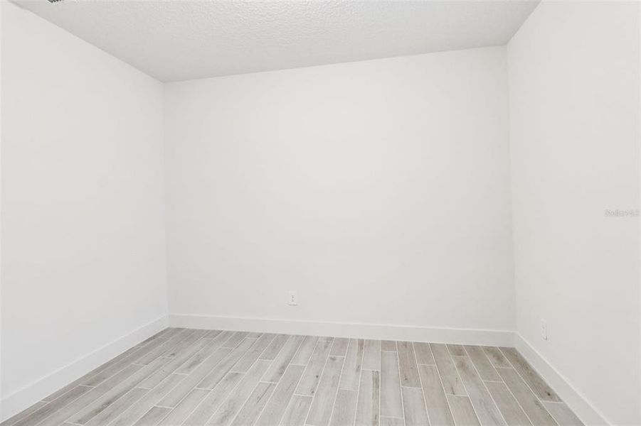 Spacious, unfurnished interior of a new home in Ridgehaven - Reserve Series, Ormond Beach (Image 37).