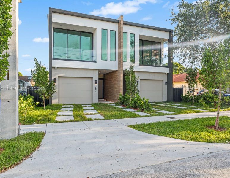 Front exterior of a new home in , Miami, FL, highlighting curb appeal (Image 26).