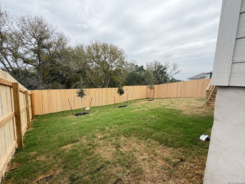 Exterior details and patio area of a home in Brookmill, San Antonio (Image 15).
