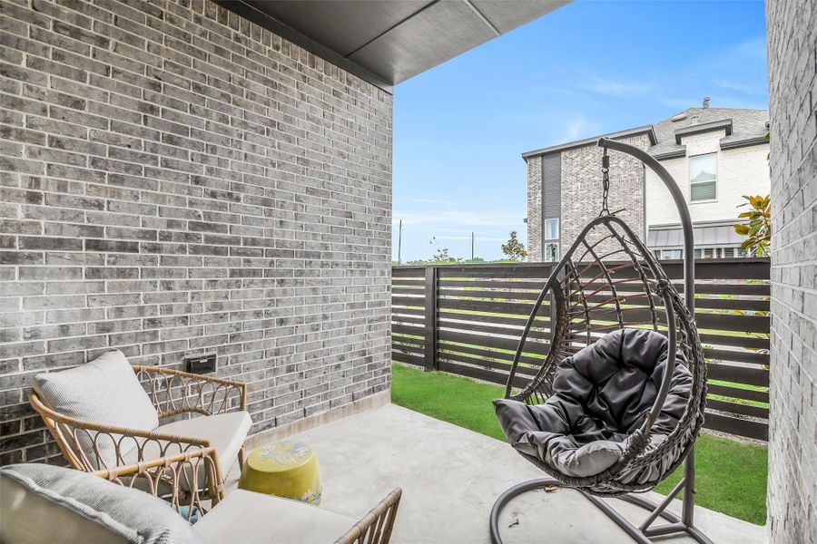Exterior details and patio area of a home in Bridgeland, Cypress (Image 4). Exterior details and patio area of a home in Bridgeland, Cypress (Image 4).