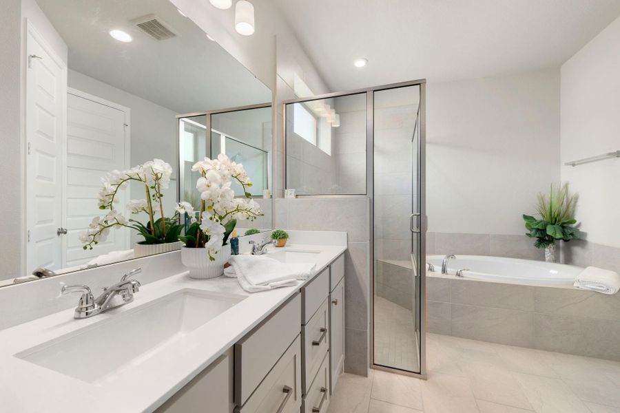 Primary en-suite bath designed for comfort & everyday convenience.
