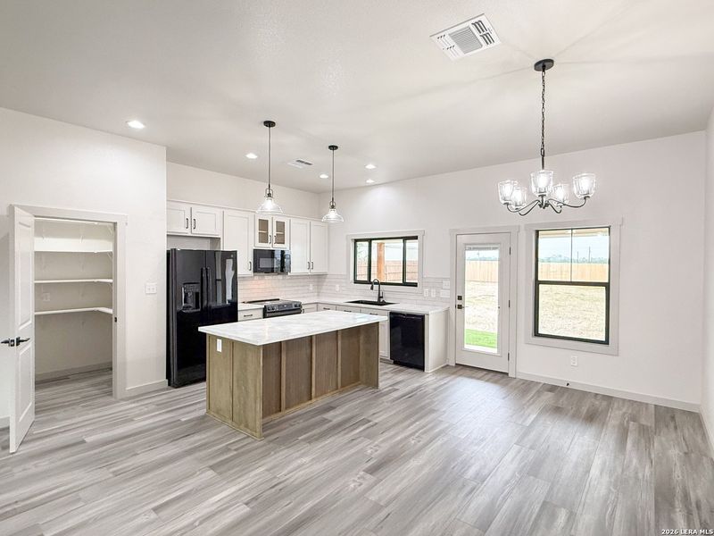 Furnished interior view inside a new home in , Devine (Image 12).