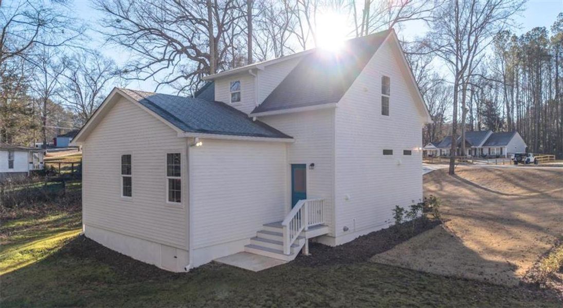 Exterior details and patio area of a home in , Bowdon (Image 3).