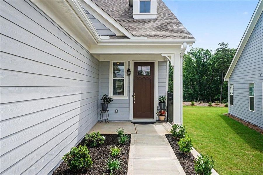 Exterior details and patio area of a home in , Hoschton (Image 26).