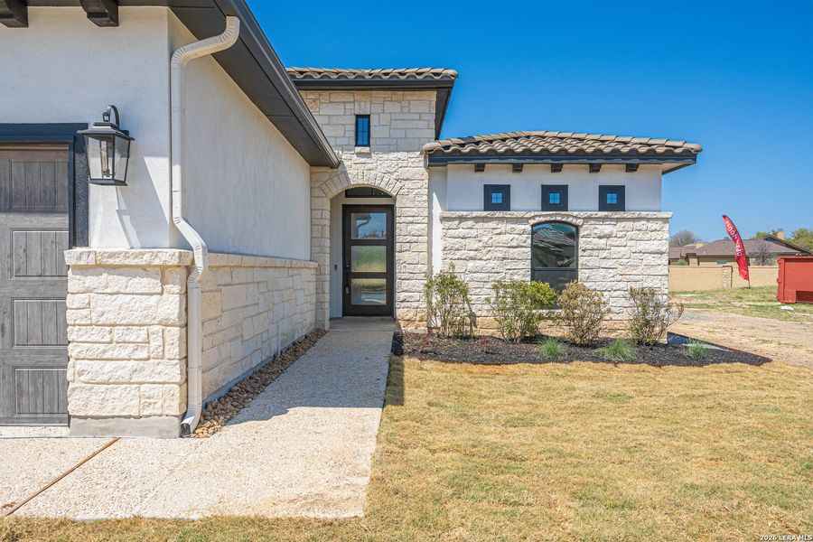 Exterior details and patio area of a home in , Kerrville (Image 23).