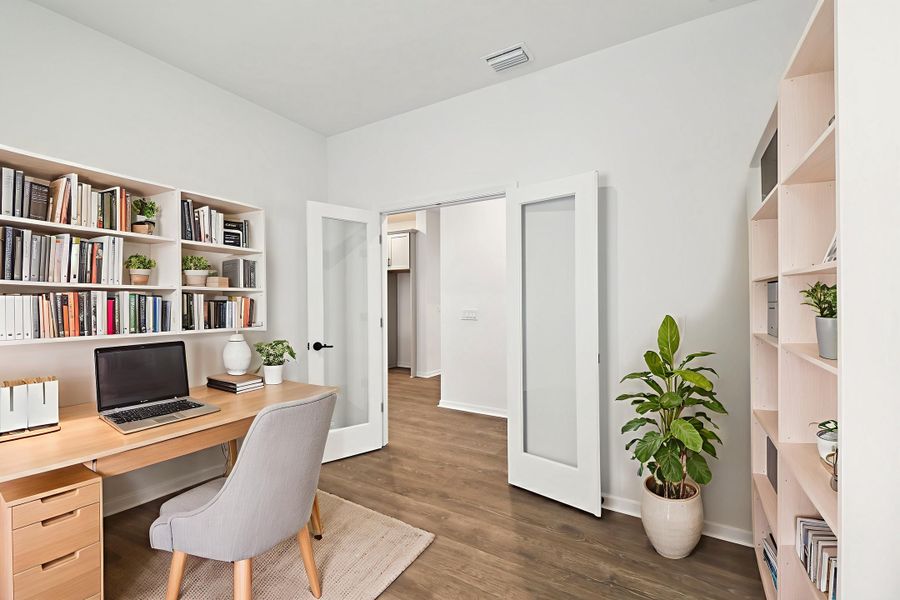 Representative furnished interior of a home built from the The Sparkman by David Weekley Homes in Palmeras at Crossprairie – The Grove Collection, St. Cloud (Image 6).