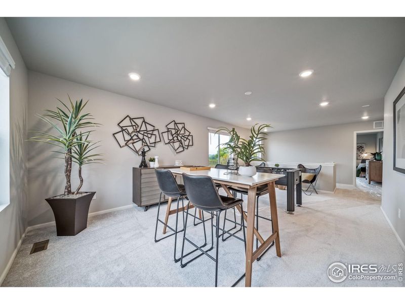 Furnished interior view inside a new home in Thompson River Ranch, Johnstown (Image 38).