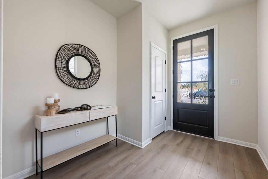 Representative furnished interior of a home built from the Granbury by Ashton Woods in The Trails at Carmel, Pflugerville (Image 6).