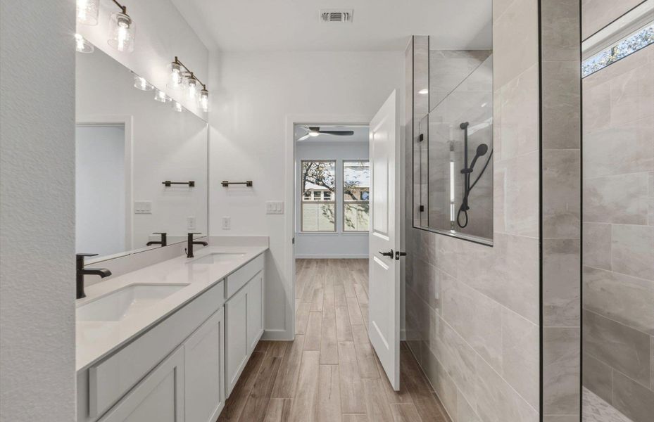 Furnished interior view inside a new home in Wolf Ranch, Georgetown (Image 8).