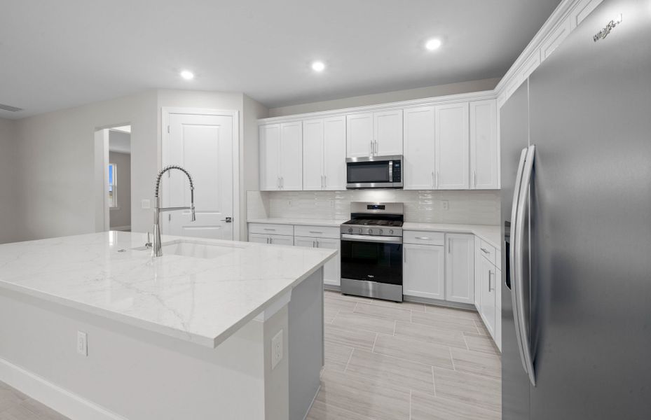 Furnished interior view inside a new home in Del Webb Oak Creek, North Fort Myers (Image 9).