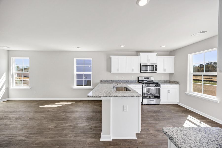 Furnished interior view inside a new home in The Park at Wilkinson, Orangeburg (Image 8). Furnished interior view inside a new home in The Park at Wilkinson, Orangeburg (Image 8).