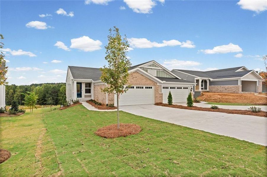 Front exterior of a new home in Villas at Gold Creek, Dawsonville, GA, highlighting curb appeal (Image 21).