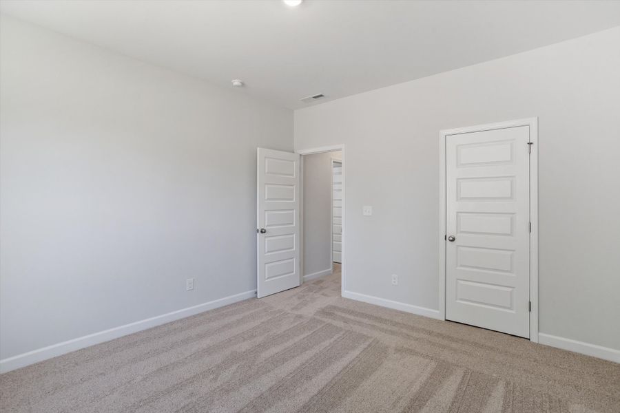 Spacious, unfurnished interior of a new home in Ovation at Sweetbrier, Durham (Image 30).
