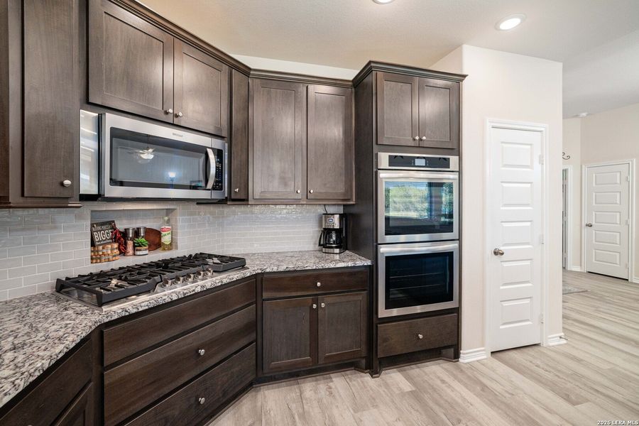 Furnished interior view inside a new home in , Bandera (Image 32).