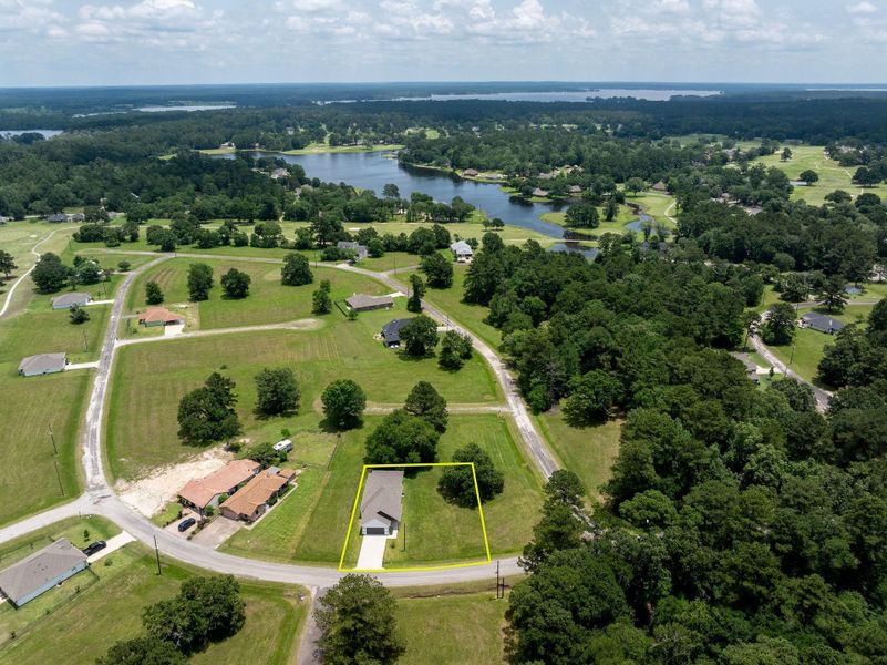 Front exterior of a new home in , Trinity, TX, highlighting curb appeal (Image 2).