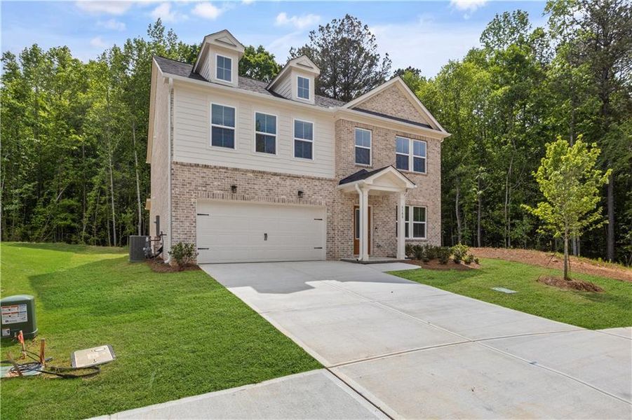 Front exterior of a new home in Briar Creek, Atlanta, GA, highlighting curb appeal (Image 13).