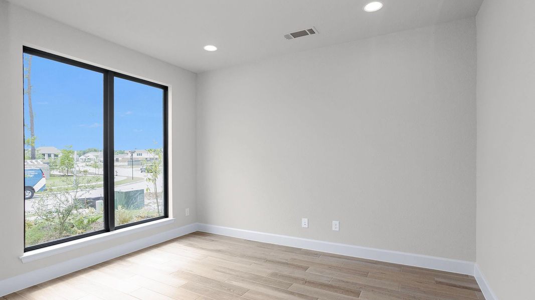 Spacious, unfurnished interior of a new home in Artavia 55' - Valencia, Conroe (Image 11). Spacious, unfurnished interior of a new home in Artavia 55' - Valencia, Conroe (Image 11).