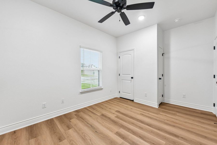A quiet bedroom showcases 2 closets for exceptional organization. A quiet bedroom showcases 2 closets for exceptional organization.