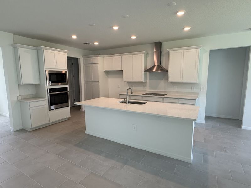 Furnished interior view inside a new home in Country Club Estates, Palm Bay (Image 3).