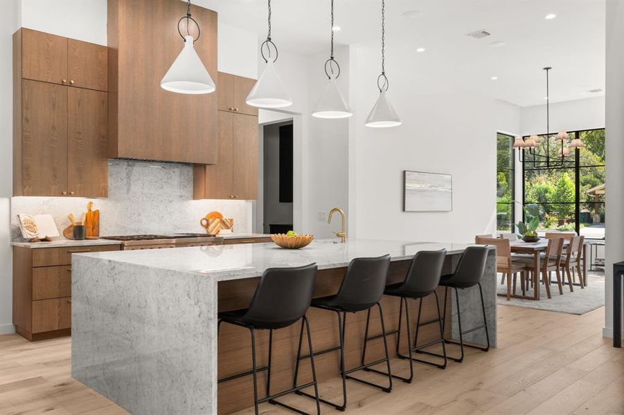 The large marble island is perfect for entertaining.