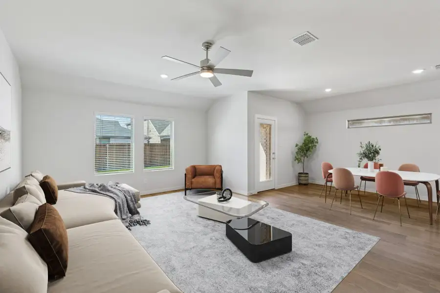 Living Room in the Harrison home plan by Trophy Signature Homes – REPRESENTATIVE PHOTO Living Room in the Harrison home plan by Trophy Signature Homes – REPRESENTATIVE PHOTO