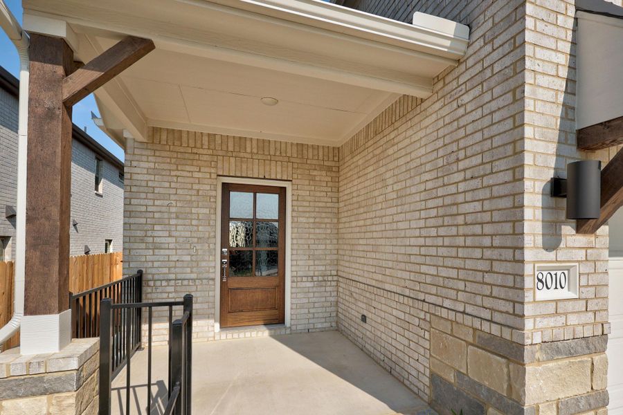Exterior details and patio area of a home in Lakeside at Tessera, Lago Vista (Image 3).