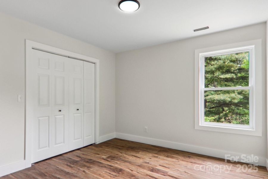 Spacious, unfurnished interior of a new home in , Waynesville (Image 37).