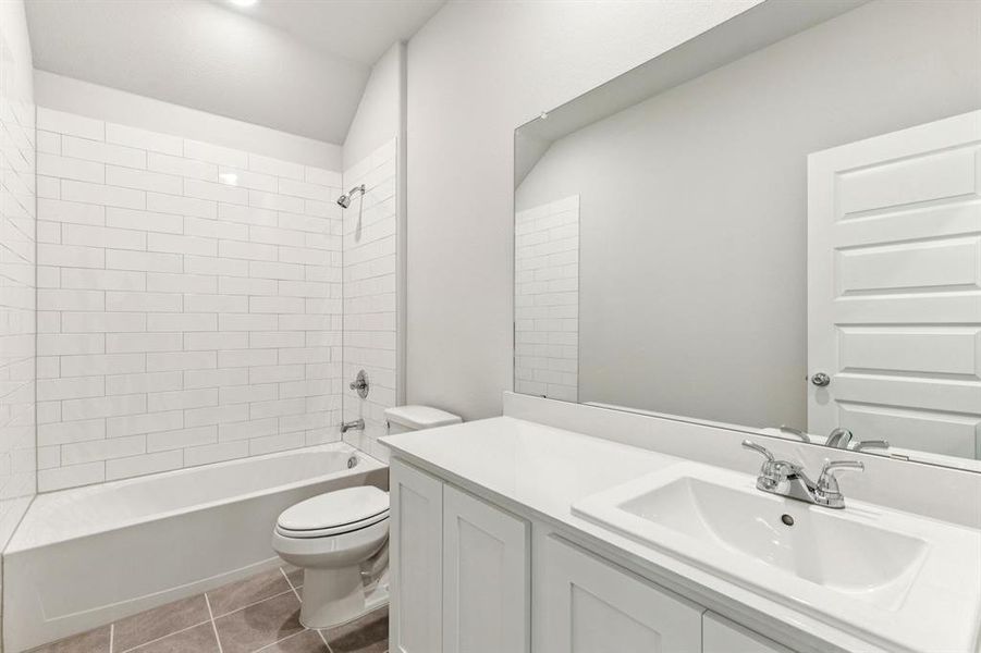 Bathroom in the Wimbledon home plan by Trophy Signature Homes – REPRESENTATIVE PHOTO