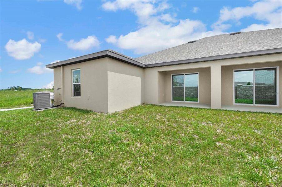 Exterior details and patio area of a home in Gum Lake Preserve, Lake Alfred (Image 4).
